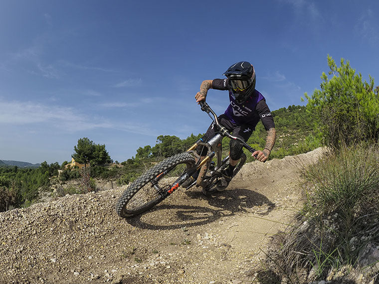 Man on bike on dirt track