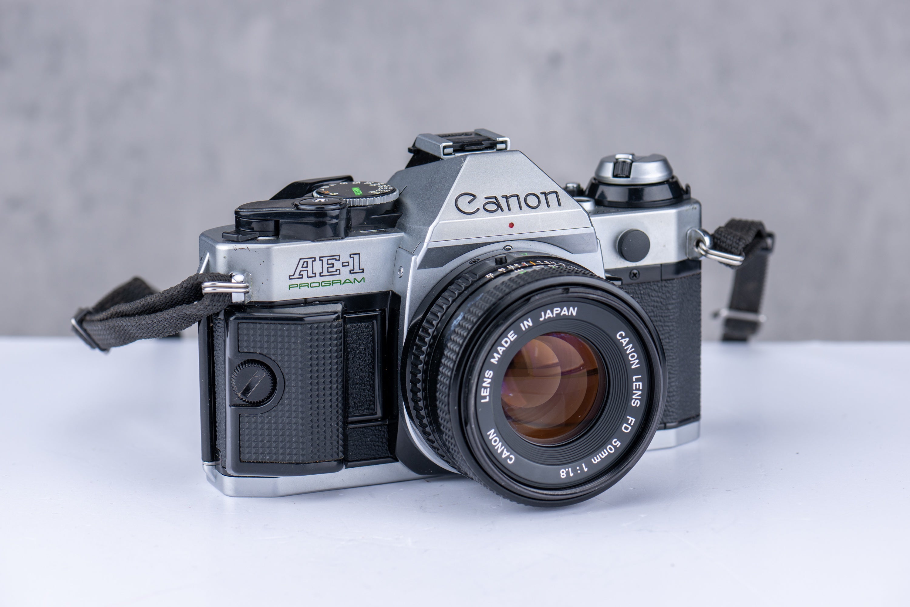 Used Canon AE-1  Program + 50mm f/1.8 35mm,  75-200mm f/4.5 & 188A [1927977]