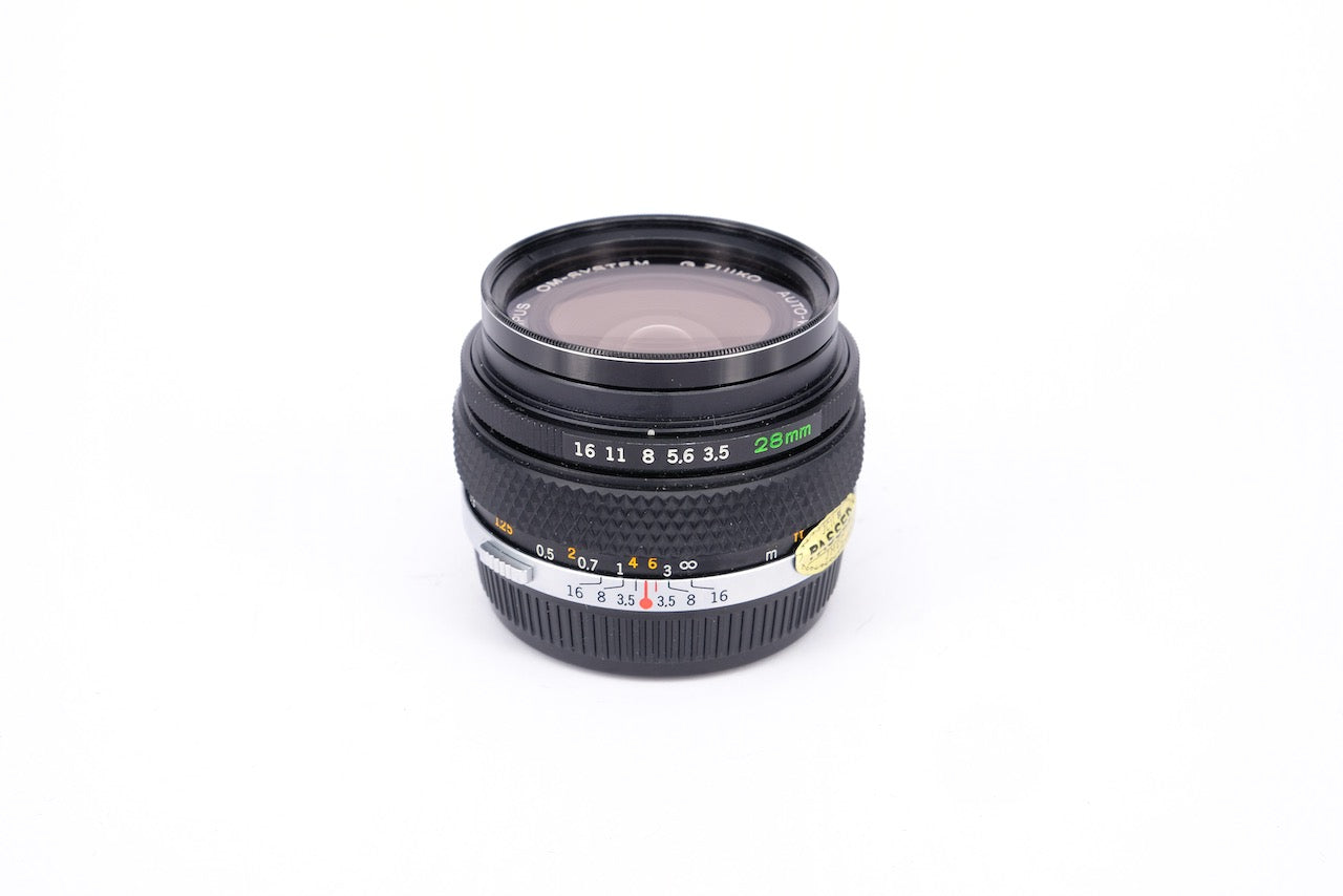 Used Olympus OM Zuiko Auto-W 28mm f/3.5 Lens