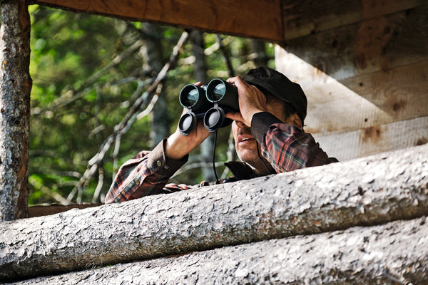 Man using Binoculars from viewing point