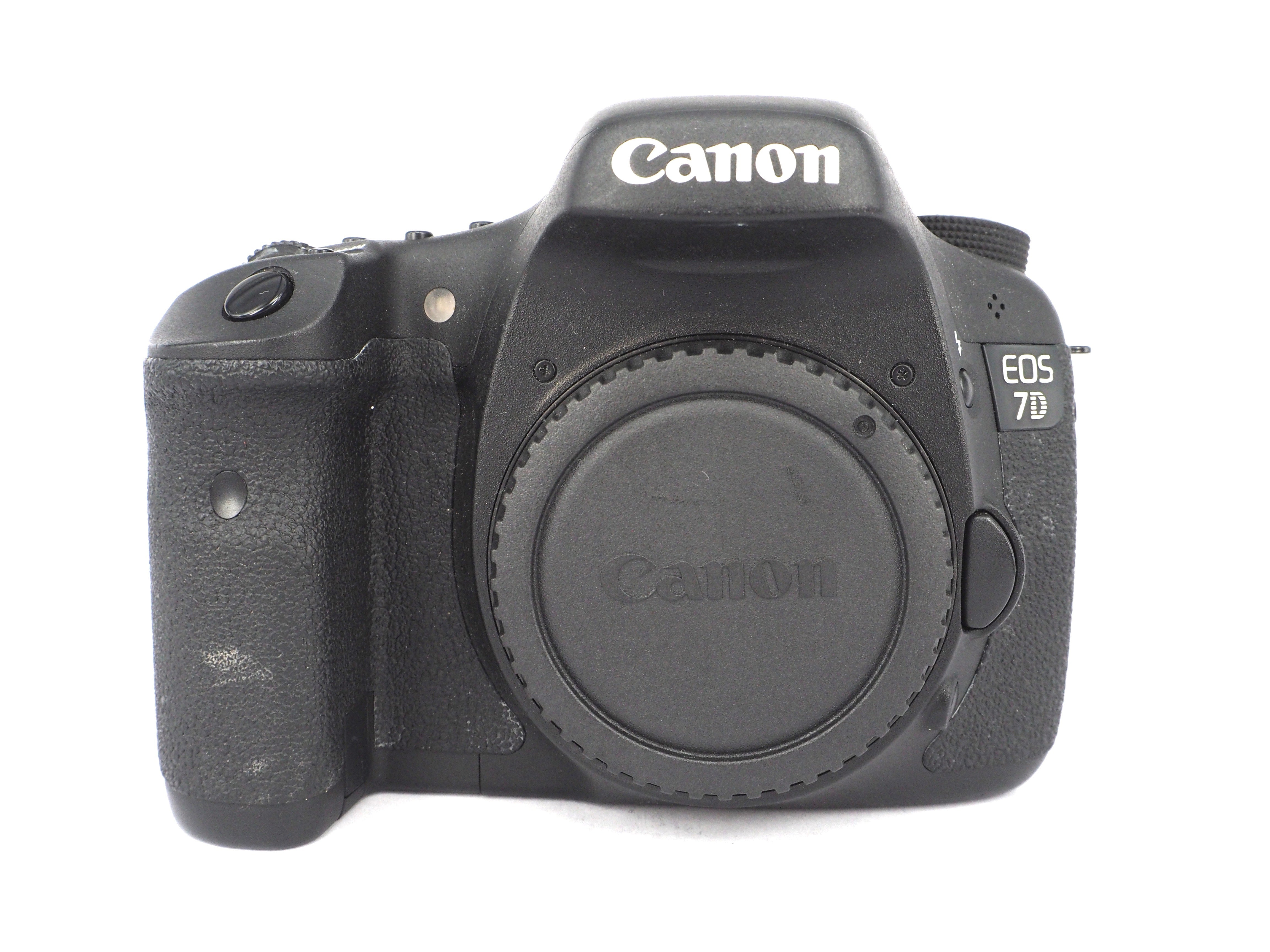Nikon 1 S1 1Used Canon EOS 7D Digital SLR Cameraamera with 11-27.5mm VR 1 NIKKOR Lens